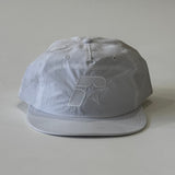 White cap with a logo on a white background